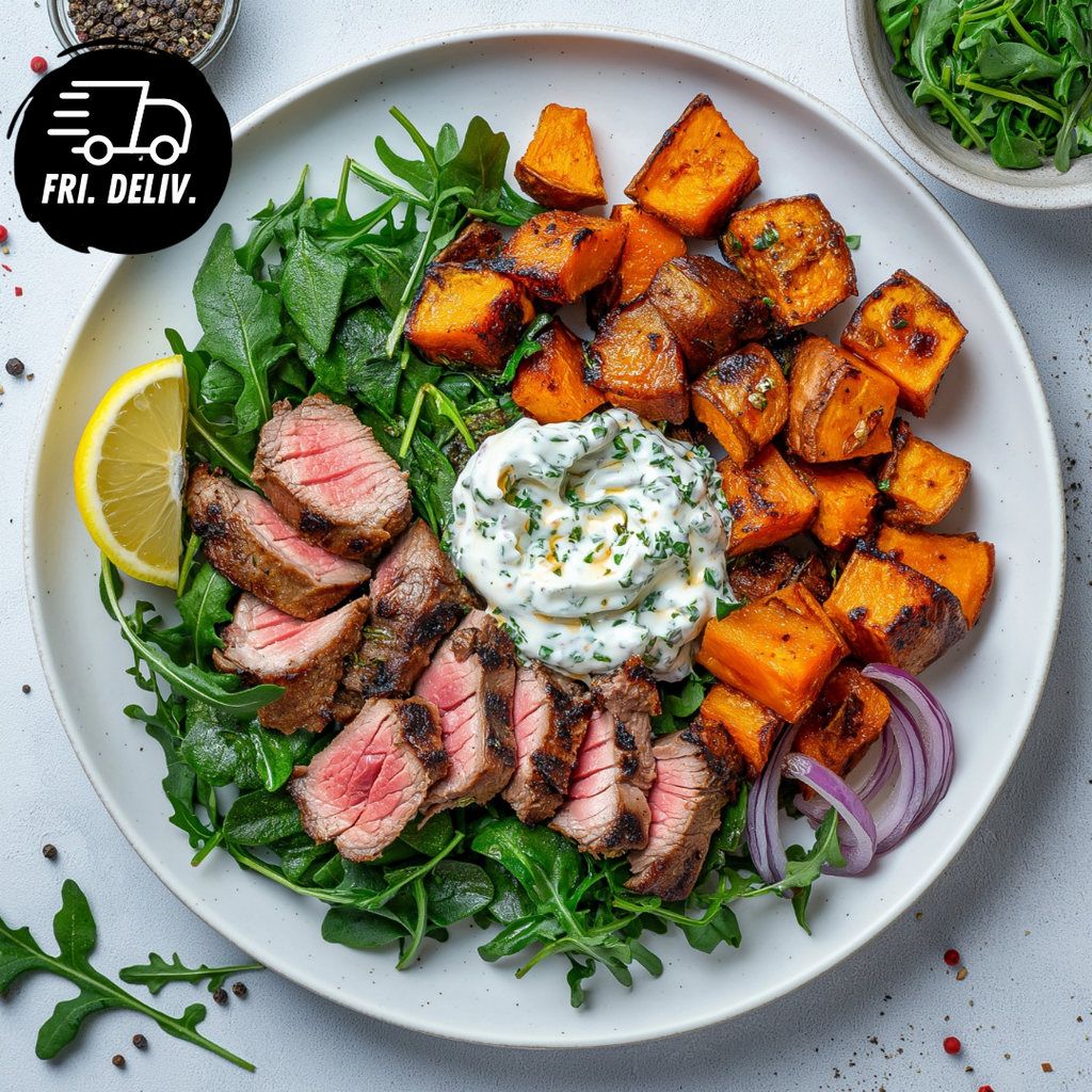 ROAST LAMB WITH ROASTED SWEET POTATO ROCKET AND HERB AIOLI.