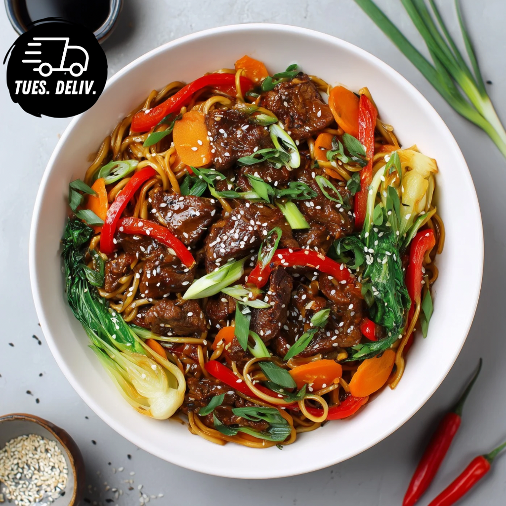 BEEF MONGOLIAN NOODLES WITH VEGETABLES.
