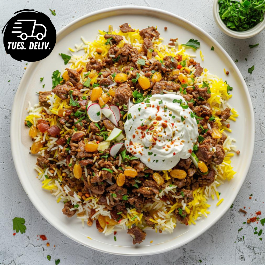 LEBANESE JEWELLED KABSA BOWL WITH MINCED BEEF AND GARLIC YOGHURT.