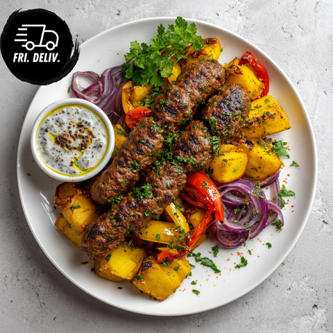 CHARGRILLED KEFTA WITH HERB POTATOES & BABA GHANOUSH.