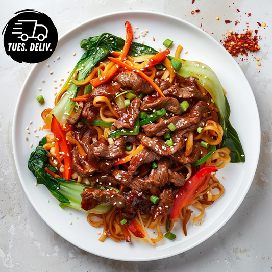 BEEF MONGOLIAN NOODLES WITH VEGETABLES.