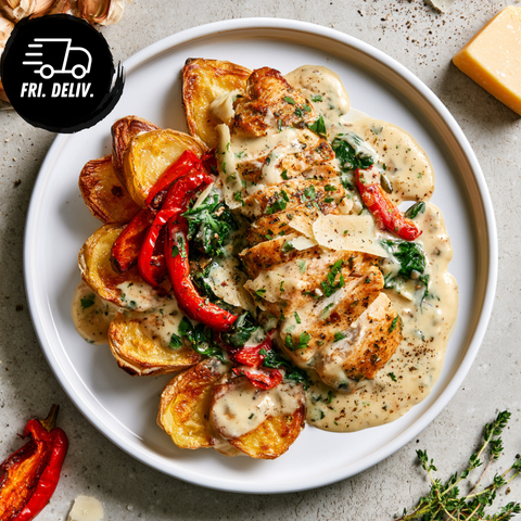 CREAMY ROAST GARLIC CHICKEN WITH PARMESAN POTATOES.